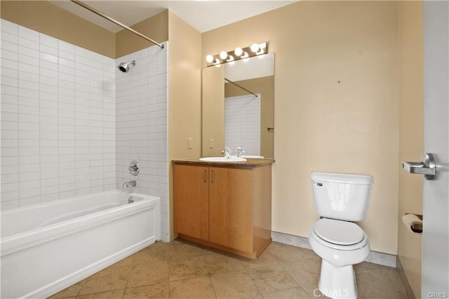 full bathroom with toilet, tile patterned flooring, shower / bath combination, vanity, and baseboards
