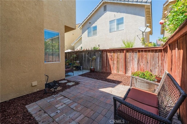view of patio featuring a fenced backyard