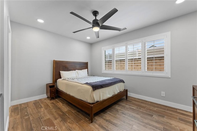 19931 Leecrest Ln, Huntington Beach, CA 92646 - bedroom with wood finished floors, recessed lighting, baseboards, and ceiling fan
