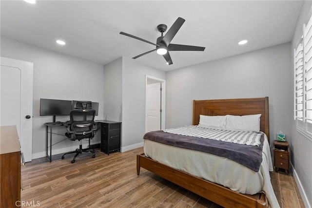 19931 Leecrest Ln, Huntington Beach, CA 92646 - bedroom with wood finished floors, baseboards, recessed lighting, ceiling fan, and a desk