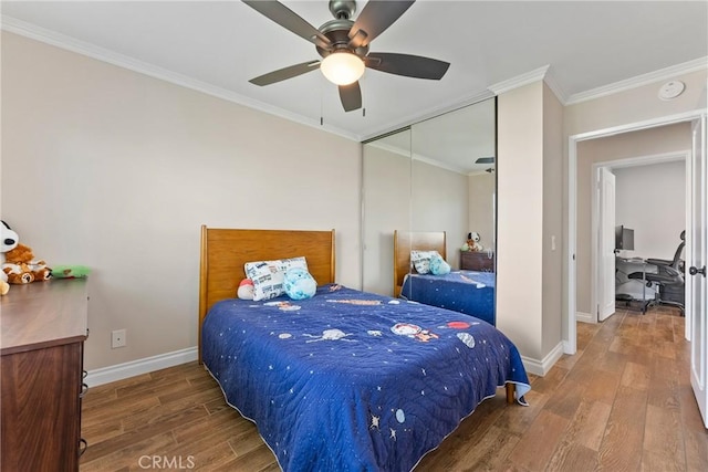 19931 Leecrest Ln, Huntington Beach, CA 92646 - bedroom featuring wood finished floors, ornamental molding, baseboards, ceiling fan, and a closet