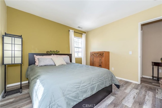80 Great Lawn, Irvine, CA 92620 - bedroom featuring wood finished floors and baseboards