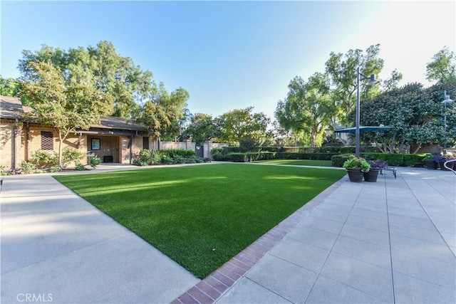 80 Great Lawn, Irvine, CA 92620 - view of grassy yard with a patio area