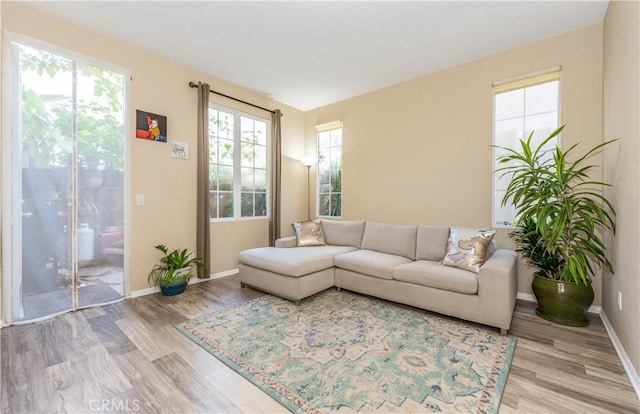 80 Great Lawn, Irvine, CA 92620 - living room with light wood-type flooring and baseboards