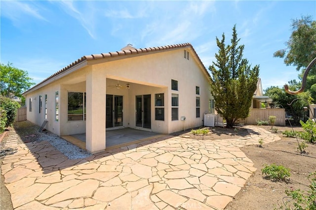 29365 Sparkling Dr, Menifee, CA 92584 - back of property with ceiling fan, stucco siding, a patio, and a tiled roof