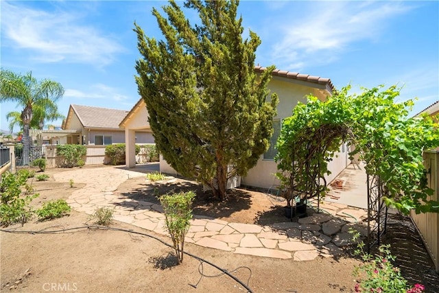 29365 Sparkling Dr, Menifee, CA 92584 - back of house with a patio, a fenced backyard, stucco siding, and a tiled roof