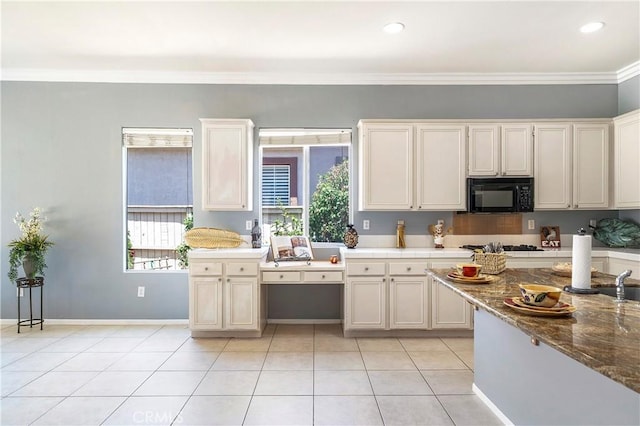 29365 Sparkling Dr, Menifee, CA 92584 - kitchen with black microwave, ornamental molding, light tile patterned floors, recessed lighting, and baseboards