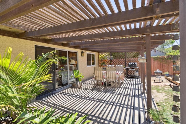 1093 Hickory View Cir, Camarillo, CA 93012 - view of patio with outdoor dining area, a pergola, and fence