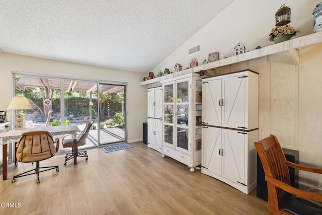 1093 Hickory View Cir, Camarillo, CA 93012 - home office with a textured ceiling, light wood-style floors, and vaulted ceiling