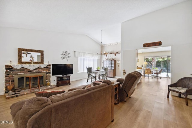 1093 Hickory View Cir, Camarillo, CA 93012 - living room with healthy amount of natural light, light wood finished floors, and high vaulted ceiling