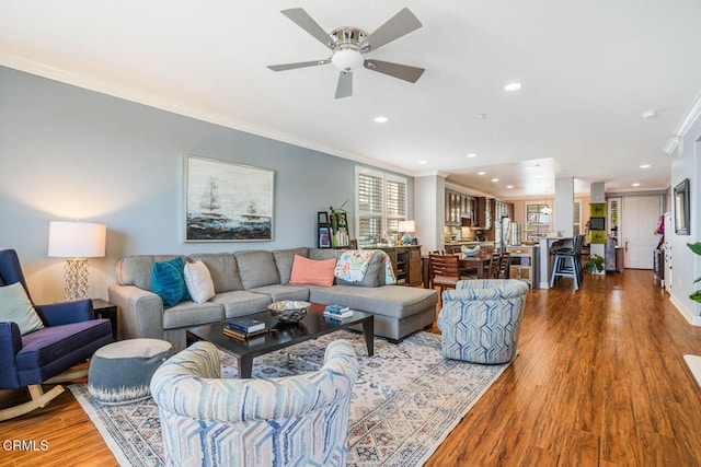 1541 Windshore Way, Oxnard, CA 93035 - living room with crown molding, a ceiling fan, wood finished floors, recessed lighting, and baseboards