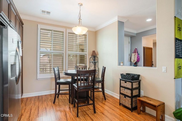 1541 Windshore Way, Oxnard, CA 93035 - dining room with baseboards, light wood-style flooring, crown molding, and recessed lighting