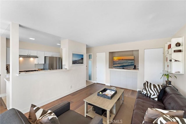 21703 Ocean Vista Dr Unit 102, Laguna Beach, CA 92651 - living area with wood finished floors and baseboards