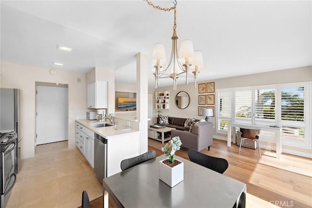 21703 Ocean Vista Dr Unit 102, Laguna Beach, CA 92651 - dining room with a chandelier