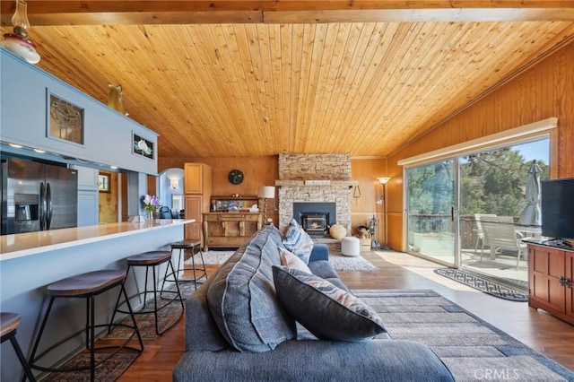 1179 Ridge Rd, Fawnskin, CA 92333 - living area with wood ceiling, vaulted ceiling, wood walls, and wood finished floors
