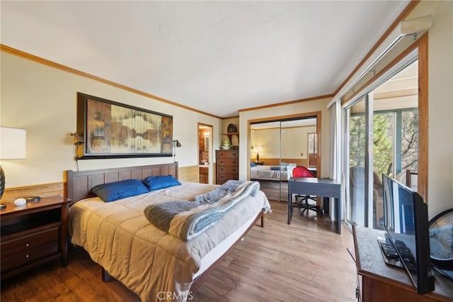 1179 Ridge Rd, Fawnskin, CA 92333 - bedroom featuring ornamental molding and wood finished floors