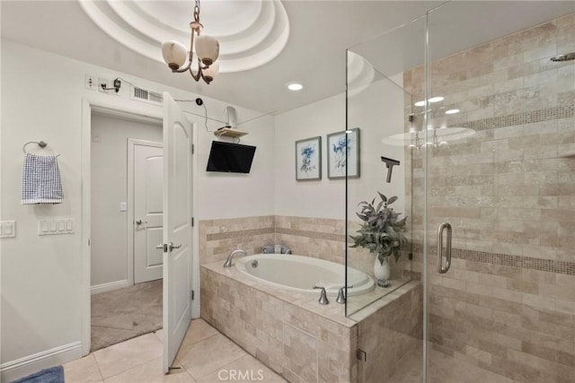 12044 Hoffman St Unit 204, Studio City, CA 91604 - full bathroom featuring a bath, tile patterned flooring, a stall shower, and baseboards