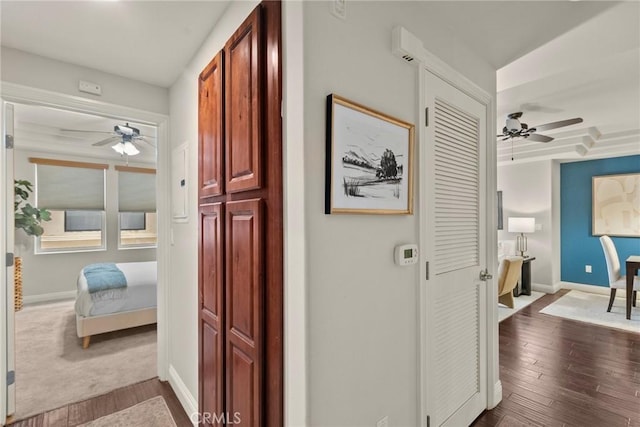 12044 Hoffman St Unit 204, Studio City, CA 91604 - hallway featuring baseboards and dark wood-style flooring