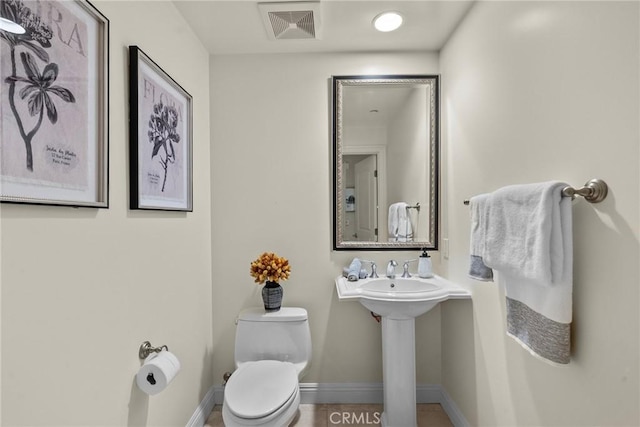 12044 Hoffman St Unit 204, Studio City, CA 91604 - half bath featuring toilet and baseboards