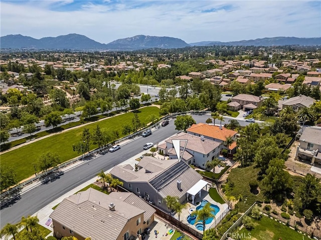 32748 Stonefield Ln, Temecula, CA 92592 - aerial perspective of suburban area featuring a mountainous background and a pool area