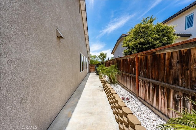32748 Stonefield Ln, Temecula, CA 92592 - view of home's exterior with stucco siding and fence