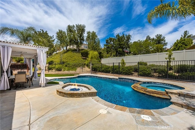 32748 Stonefield Ln, Temecula, CA 92592 - view of swimming pool with a patio, a pool with connected hot tub, a fenced backyard, outdoor dining space, and an outdoor fire pit
