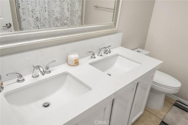 32748 Stonefield Ln, Temecula, CA 92592 - bathroom featuring toilet, double vanity, tile patterned flooring, and a shower with curtain