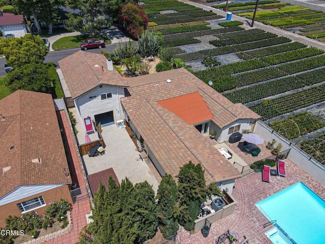 aerial view of property and surrounding area with extensive farmland