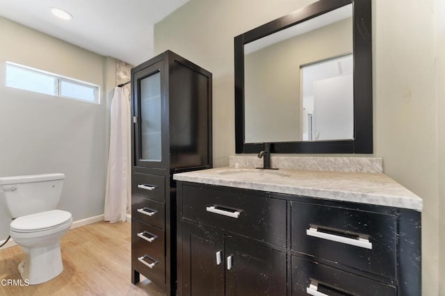 8534 Beverly Dr, San Gabriel, CA 91775 - bathroom with vanity, wood finished floors, and a shower with curtain