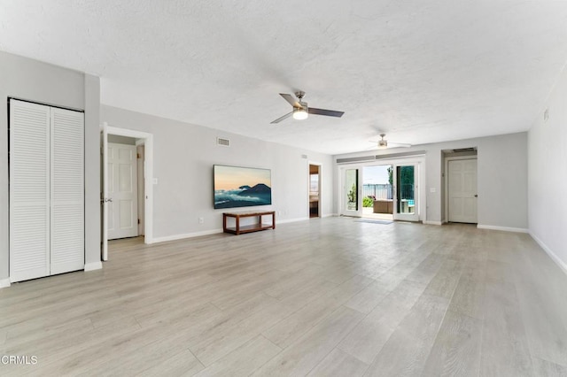 8534 Beverly Dr, San Gabriel, CA 91775 - unfurnished living room featuring a ceiling fan, light wood-style floors, and a textured ceiling