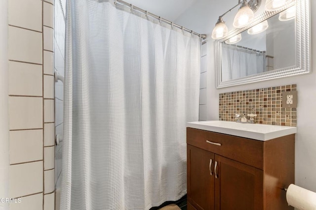 8534 Beverly Dr, San Gabriel, CA 91775 - bathroom featuring backsplash, vanity, and a shower with curtain