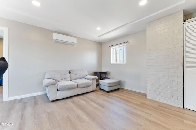 8534 Beverly Dr, San Gabriel, CA 91775 - living area featuring a wall mounted AC, light wood-type flooring, and recessed lighting