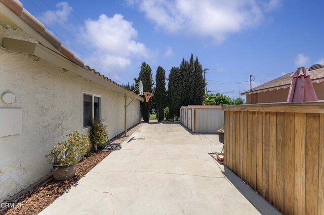 8534 Beverly Dr, San Gabriel, CA 91775 - view of patio with a storage shed