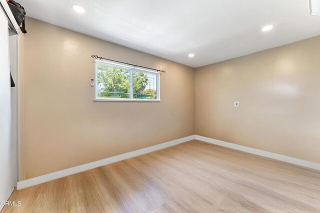 8534 Beverly Dr, San Gabriel, CA 91775 - spare room featuring wood finished floors and recessed lighting