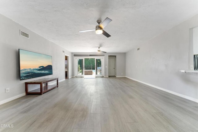 8534 Beverly Dr, San Gabriel, CA 91775 - unfurnished living room featuring ceiling fan, wood finished floors, and a textured ceiling