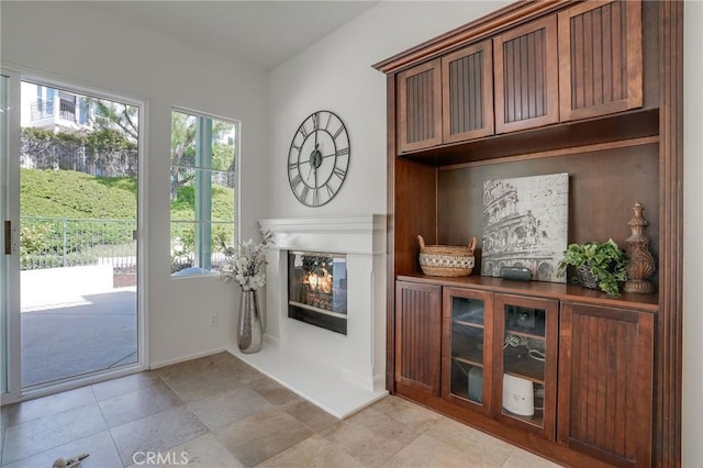 53 Via Palacio, San Clemente, CA 92673 - doorway to outside featuring a glass covered fireplace