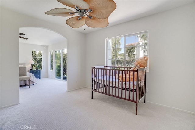 53 Via Palacio, San Clemente, CA 92673 - carpeted bedroom featuring arched walkways, ceiling fan, and baseboards