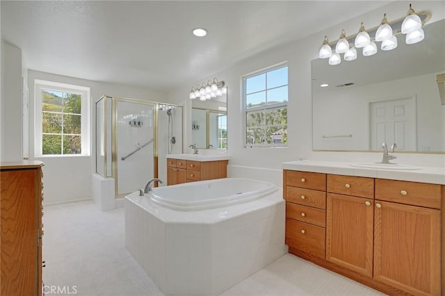 53 Via Palacio, San Clemente, CA 92673 - bathroom featuring a stall shower, a garden tub, and two vanities