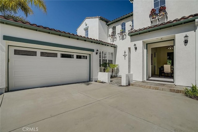 53 Via Palacio, San Clemente, CA 92673 - view of front of property featuring driveway, a garage, a tile roof, and stucco siding