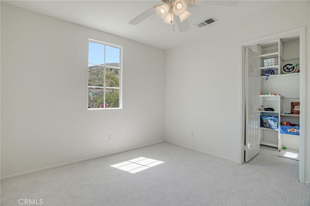 53 Via Palacio, San Clemente, CA 92673 - unfurnished bedroom featuring carpet floors, a walk in closet, a closet, and baseboards