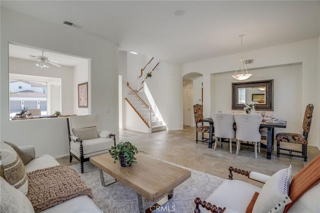 53 Via Palacio, San Clemente, CA 92673 - living room featuring stairs, arched walkways, and ceiling fan