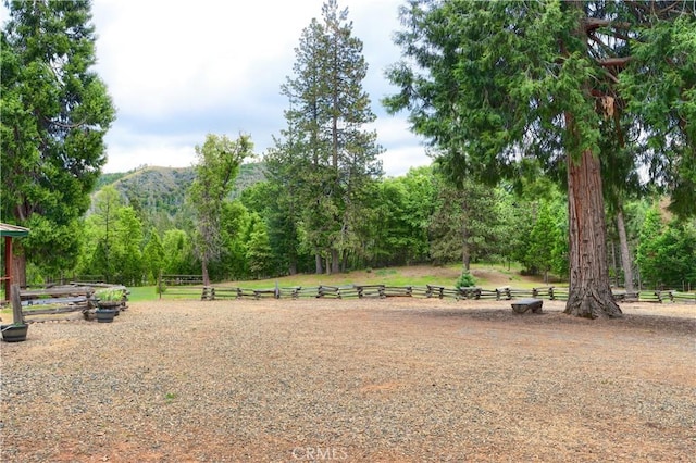 7072 Cranes Nest Rd, Mariposa, CA 95338 - view of yard with a wooded view and a mountain view