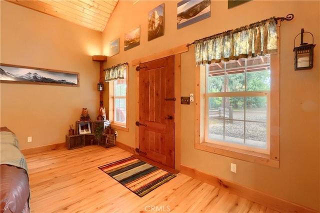 7072 Cranes Nest Rd, Mariposa, CA 95338 - foyer entrance with wood finished floors, baseboards, lofted ceiling, and wooden ceiling