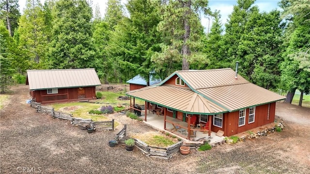 7072 Cranes Nest Rd, Mariposa, CA 95338 - back of house with metal roof and a porch