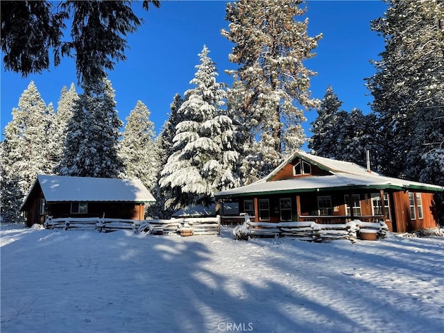7072 Cranes Nest Rd, Mariposa, CA 95338 - snow covered back of property featuring covered porch