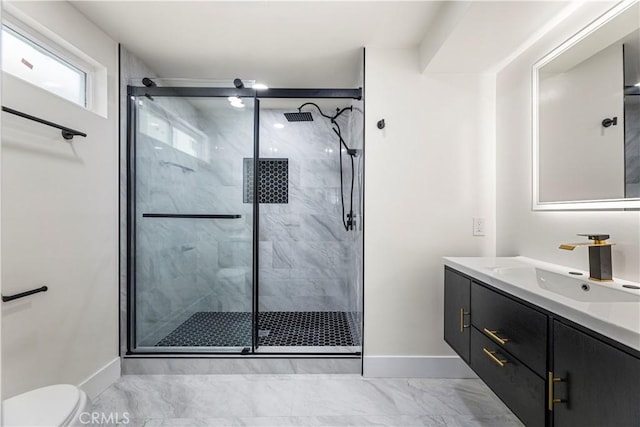 8064 Crosnoe Ave, Panorama City, CA 91402 - bathroom with baseboards, toilet, marble finish floors, and a shower stall