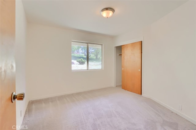 3820 Pinecrest Dr, Mariposa, CA 95338 - unfurnished bedroom with carpet flooring, a closet, and baseboards