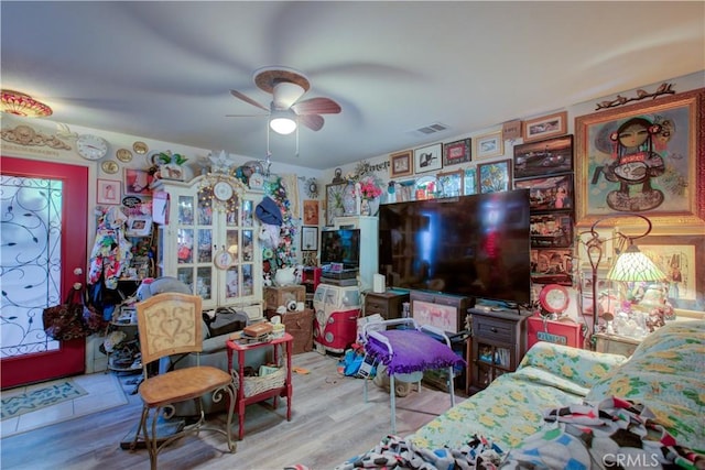 4374 Briggs Ln, Merced, CA 95348 - living area with ceiling fan and wood finished floors