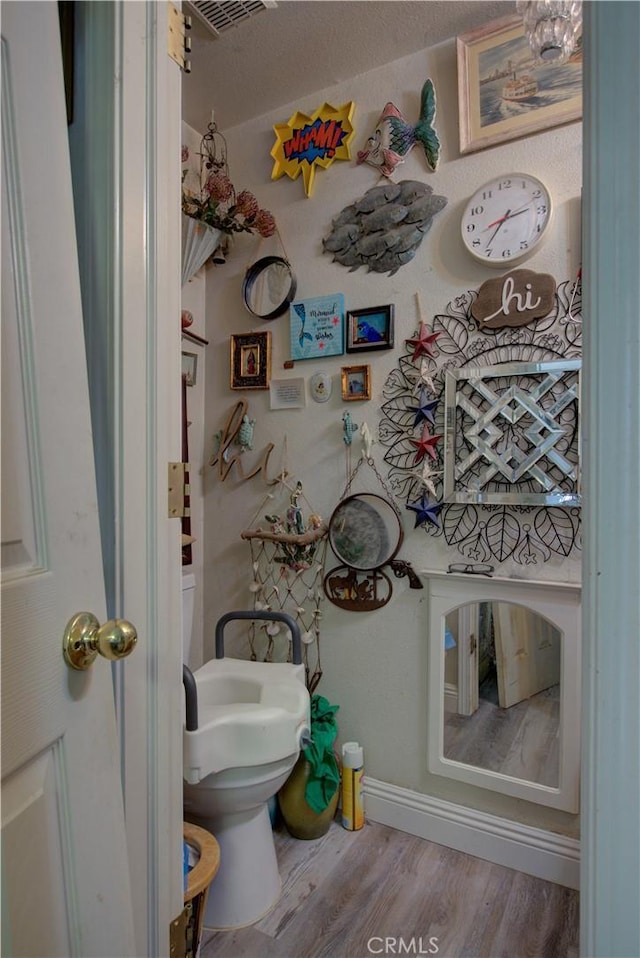 4374 Briggs Ln, Merced, CA 95348 - bathroom featuring wood finished floors and baseboards