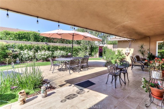 161 W Loretto Ct, Claremont, CA 91711 - view of patio featuring outdoor dining space and a fenced backyard